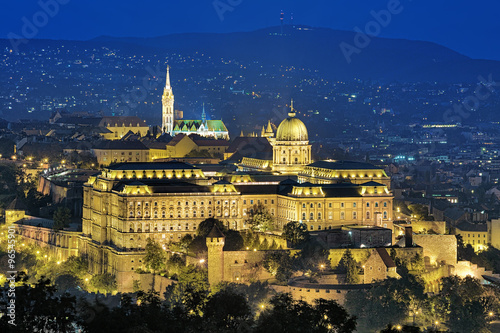 Budapest, Hungary. Buda Castle with Royal Palace and Matthias Church at evening, view from Gellert Hill.