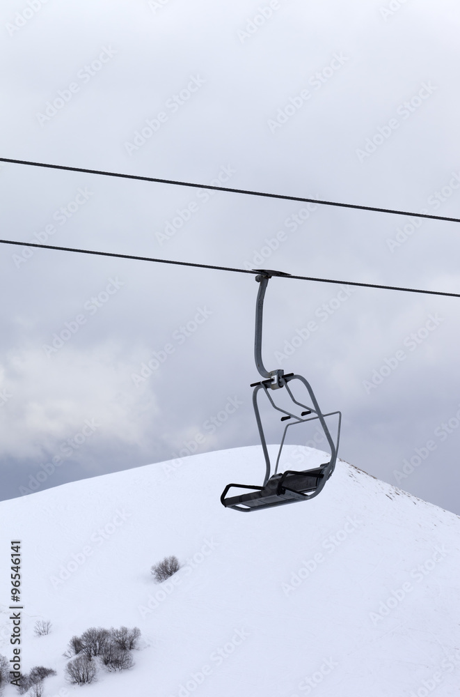 Chair lift at evening Chair lift at evening