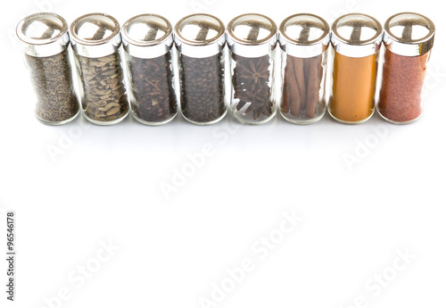 Variety of spices over white background