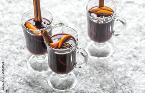 Glasses of mulled wine in snow