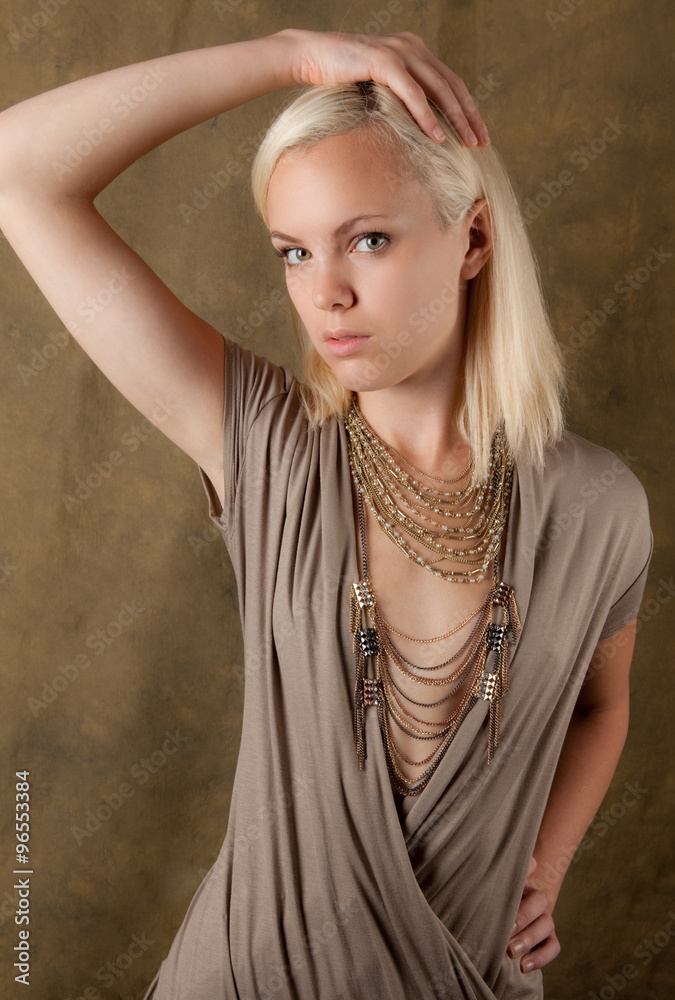 Pretty Platinum Blonde Woman in Low Cut Dress Stock Photo