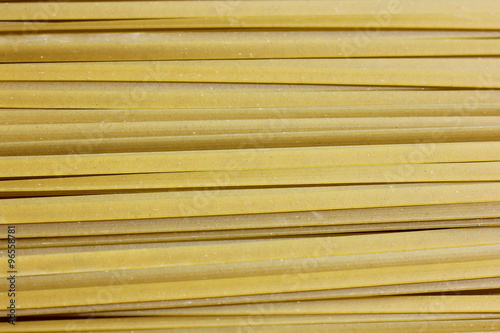 Close up of raw pasta, Green Spanich fettuccine
