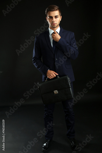 Elegant man in suit with br...