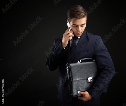 Elegant man in suit with br...