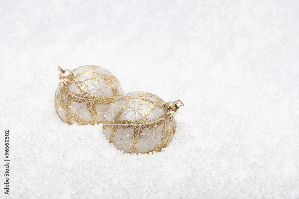 Gold and white baubles in fake snow Stock Photo Adobe Stock
