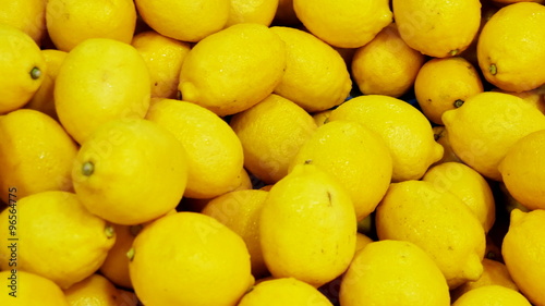 Colorful Display Of Lemons In Market 