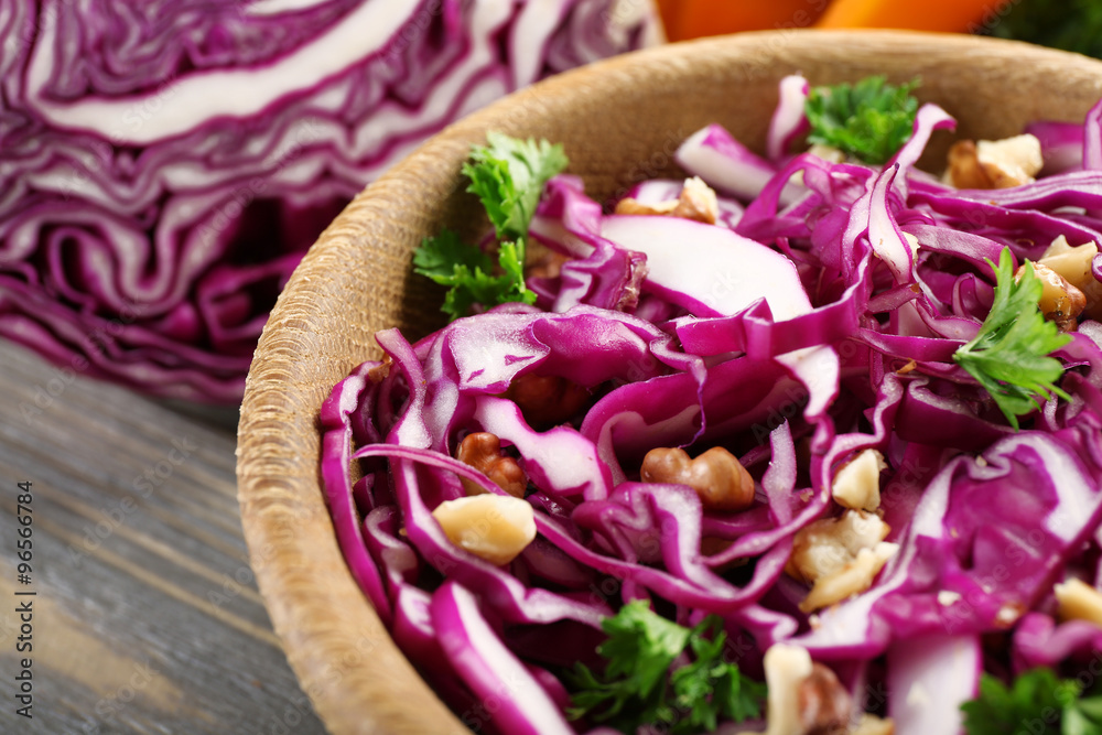 Red cabbage salad served on plate closeup Red cabbage salad served on plate closeup