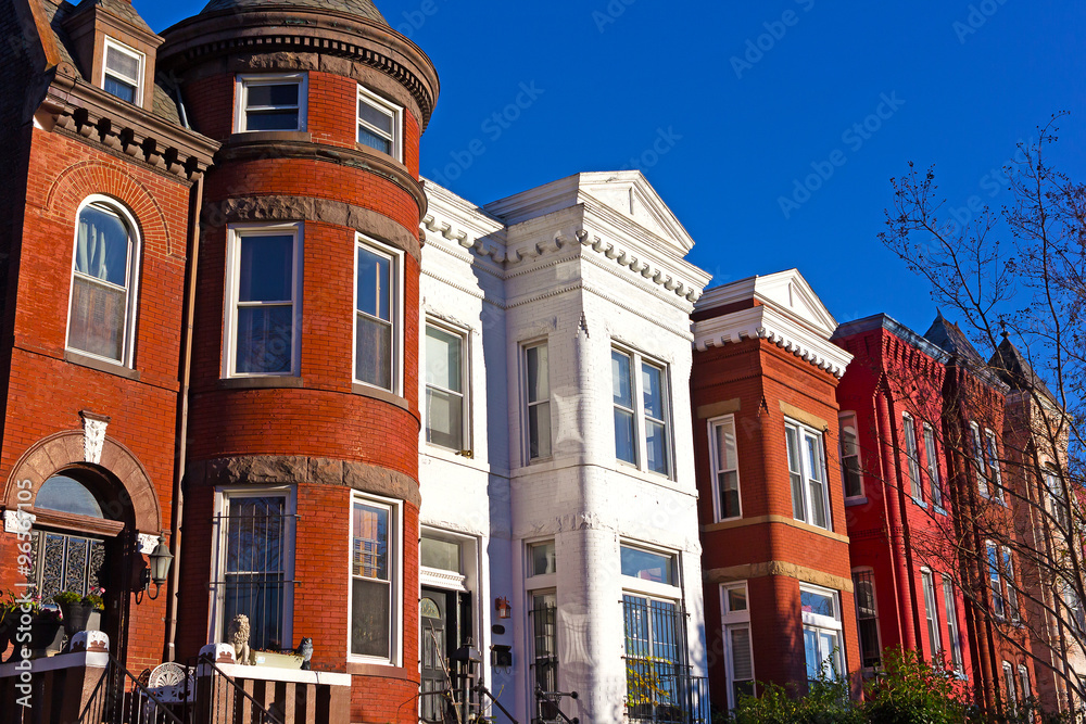Historic urban architecture in Mount Vernon suburb of Washington DC. Colorful residential row houses in US capital before sunset in late autumn.