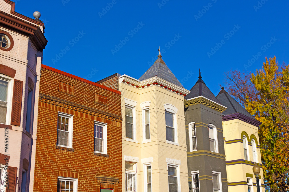 Residential row houses in US Capital in autumn. Historic urban architecture of Washington DC, USA.