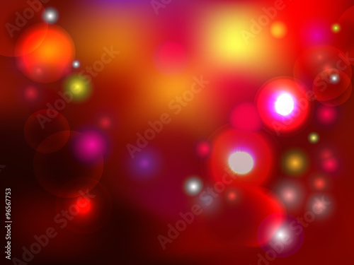 Colorful holiday background with lights and spackles