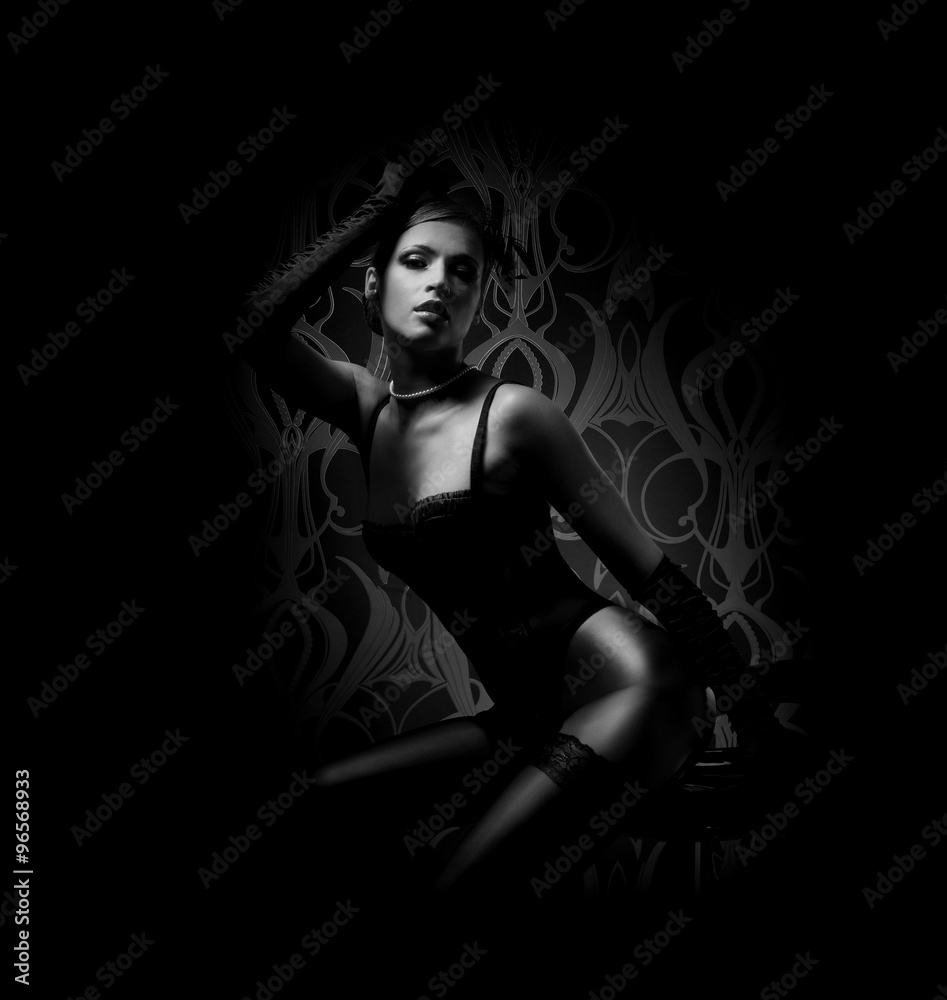 Beautiful and sexy cabaret artist in lingerie over vintage backg Beautiful and sexy cabaret artist in lingerie over vintage backg