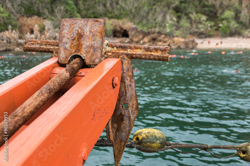 Photography .Old rusty folding grapnel anchor