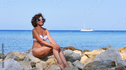 beautiful woman enjoying a vacation at the seaside 