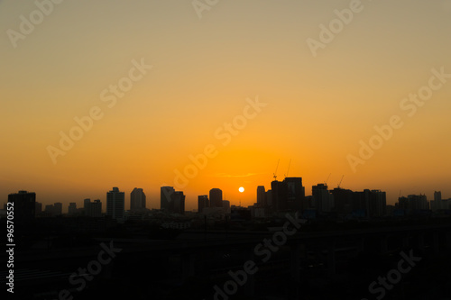 sunrise skies in city © prajit48