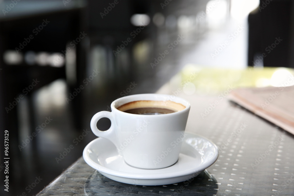 Cup of tasty coffee and newspapers in cafe Cup of tasty coffee and newspapers in cafe