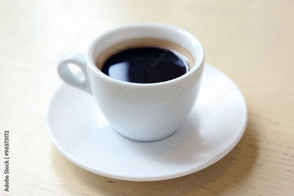 Cup of tasty coffee on table Cup of tasty coffee on table