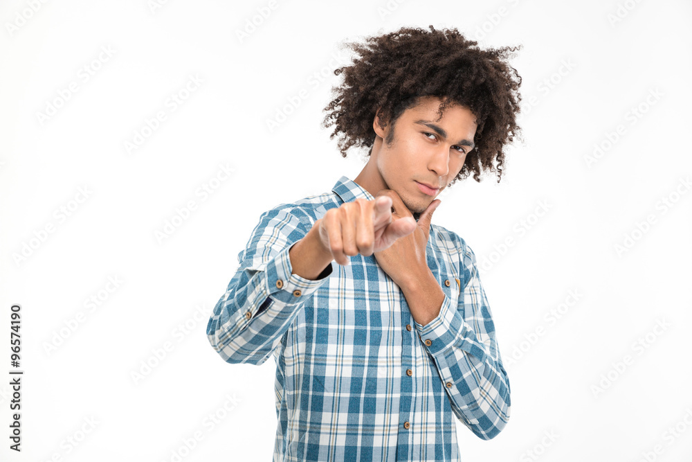 Afro american man pointing finger at camera Afro american man pointing finger at camera