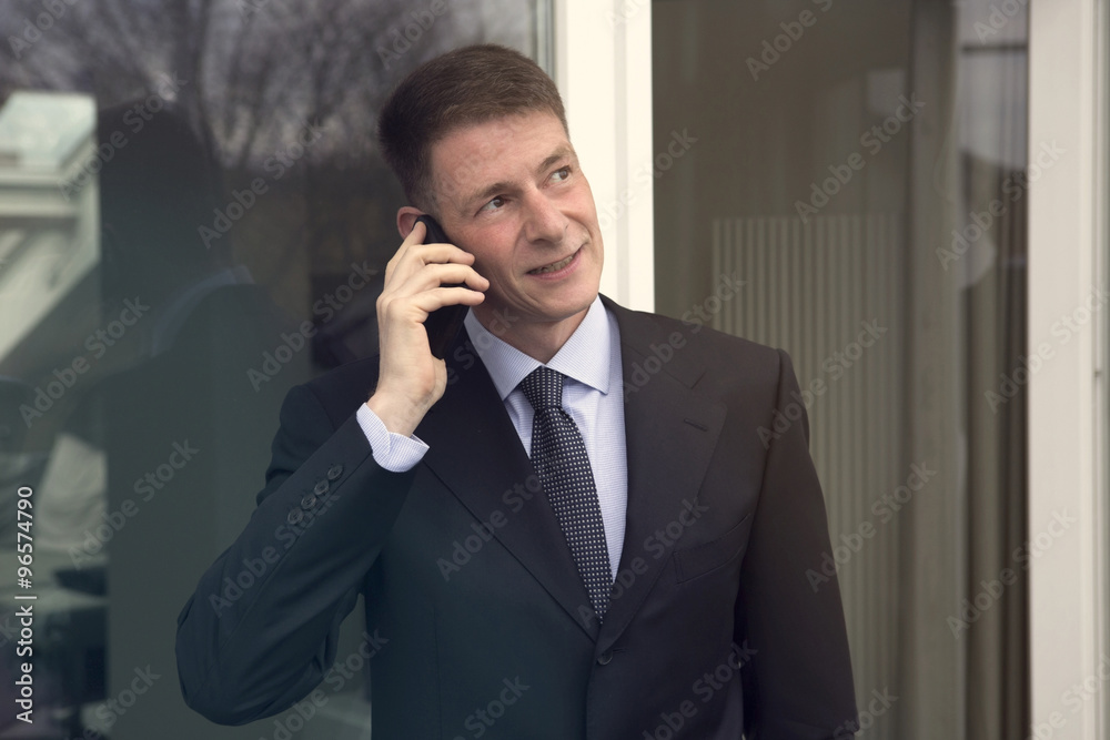 man in suit on the phone man in suit on the phone