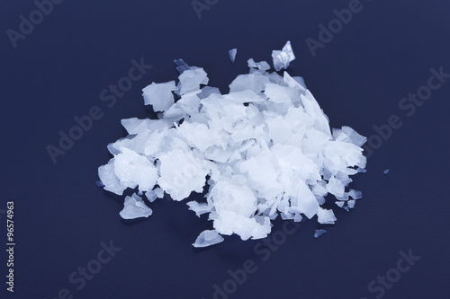 Magnesium chloride flakes -sea salt - close up photo