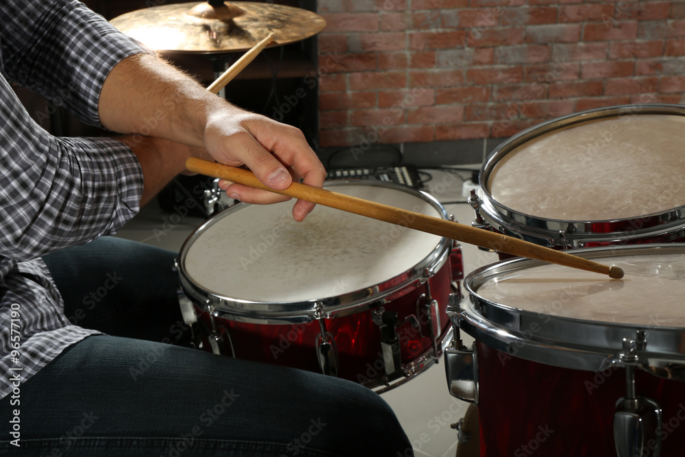 Fototapeta premium Musician playing the drums closeup