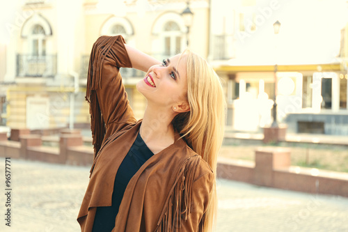 Elegant lady in the street of old city © Africa Studio