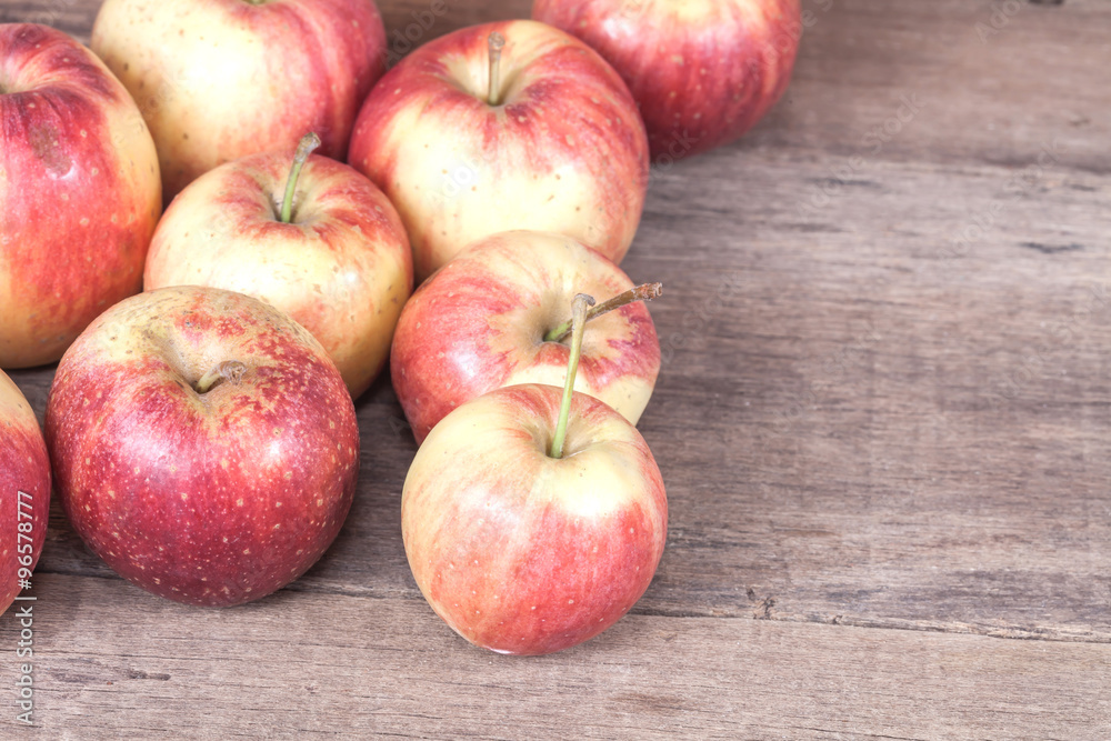 apples on wood background. apples on wood background.