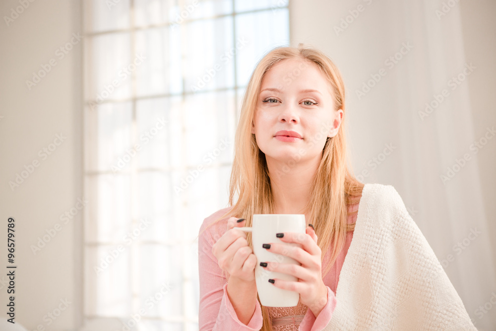 Beautiful woman drinking coffee in the morning Beautiful woman drinking coffee in the morning