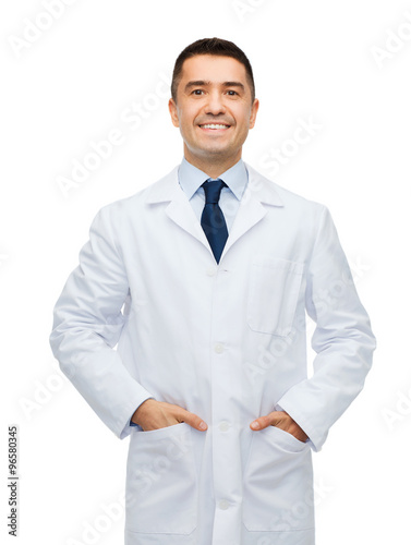 smiling male doctor in white coat