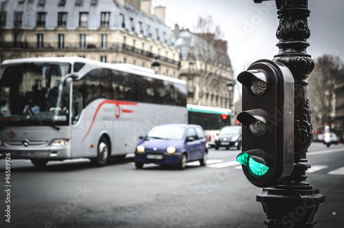 Fototapeta Naklejka Na Ścianę i Meble -  Green traffic light in the streets of Paris, France