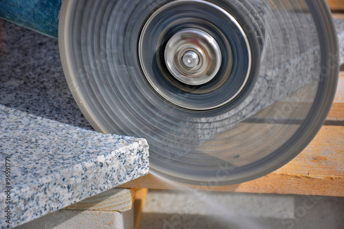 Grinder, cutting marble photo