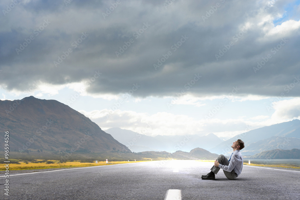 Fototapeta premium Businessman on road