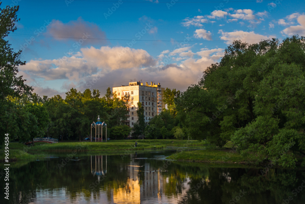 Residential buildings by the lake in nature in St. Petersburg, Russia