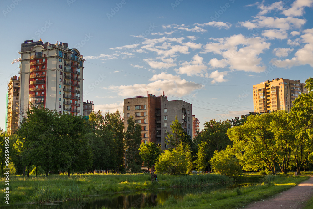 Residential buildings by the lake in nature in St. Petersburg, Russia
