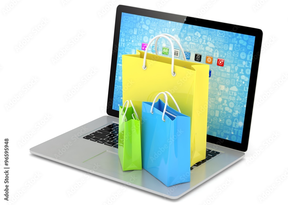laptop and shopping pags on white background laptop and shopping pags on white background