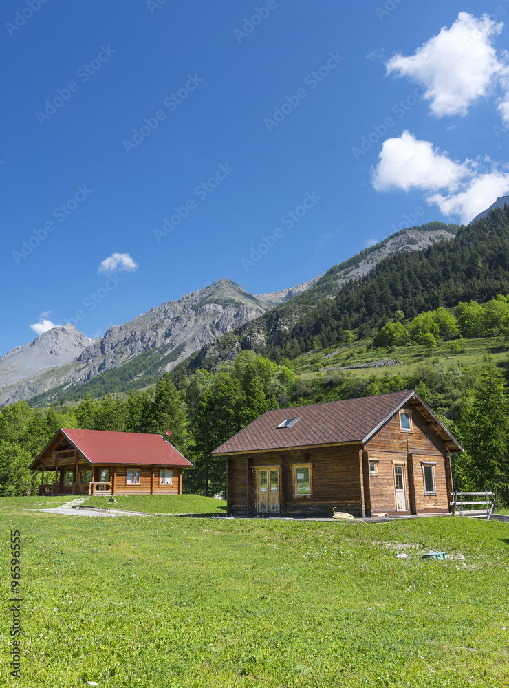 Wooden cottages in the Alps
