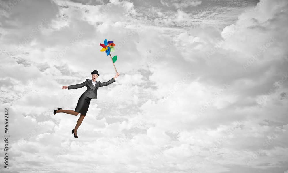 Woman flying in sky