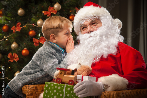 Santa Claus and a little boy photo