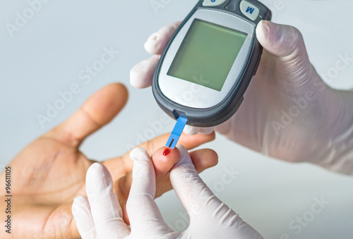 blood glucose meter, the blood sugar value is measured on a finger