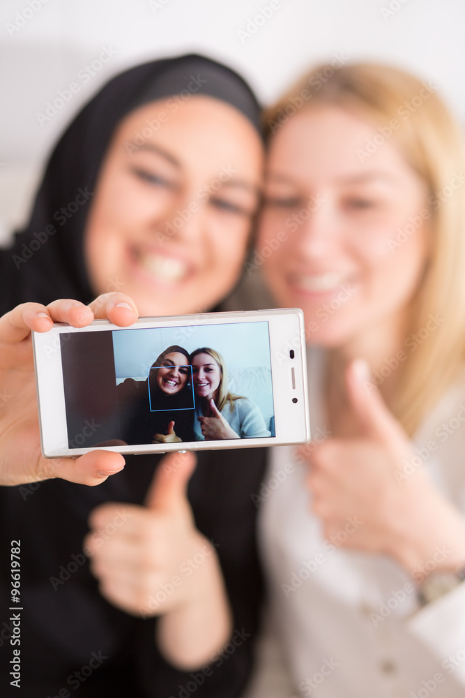 Friends taking selfie