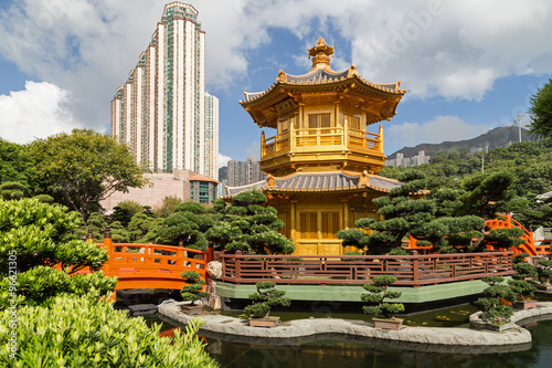 Pond, bridge and Pavilion of Absolute Perfection at the Nan Lian Garden in Hong Kong, China.