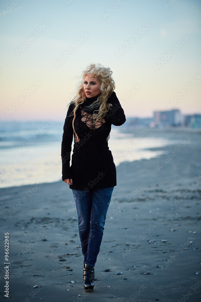 Woman walking on the beach