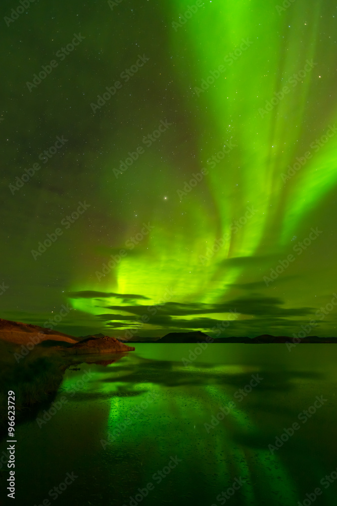 Northern lights (Aurora Borealis) reflected in the lake