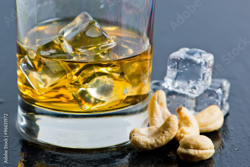 whiskey with ice and nuts