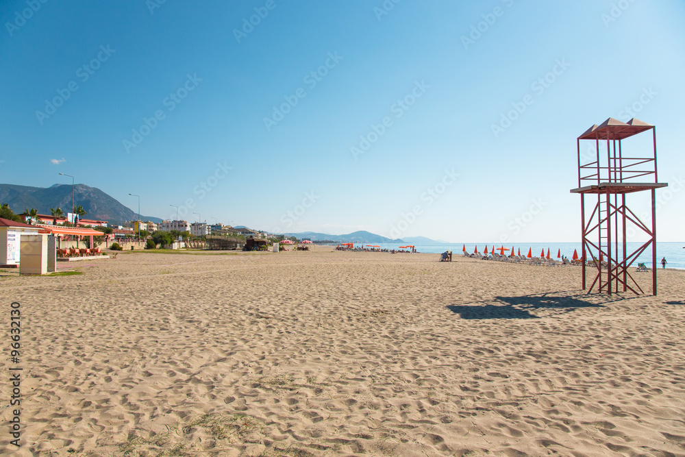 Sandy beach and beautiful view to the mountains Alanya Turkey. T