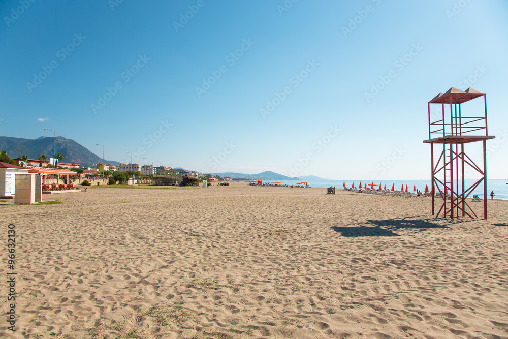 Sandy beach and beautiful view to the mountains Alanya Turkey. T Sandy beach and beautiful view to the mountains Alanya Turkey. T