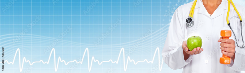 Naklejka premium Doctor hands with apple and dumbbell.