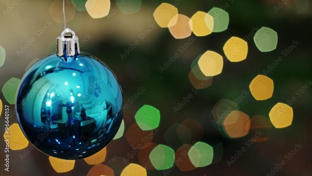 Blue ball spinning at bokeh lights. Title area Blue ball spinning at bokeh lights. Title area