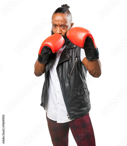 black man fighting with boxing gloves