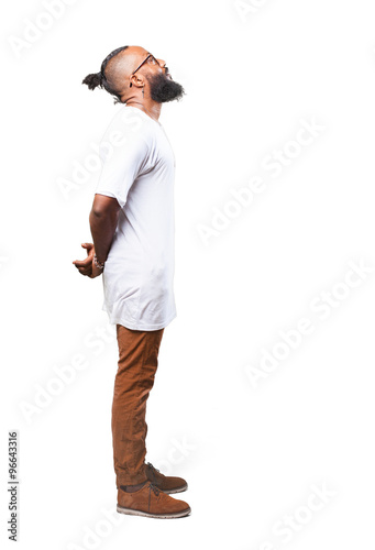 black man standing over white
