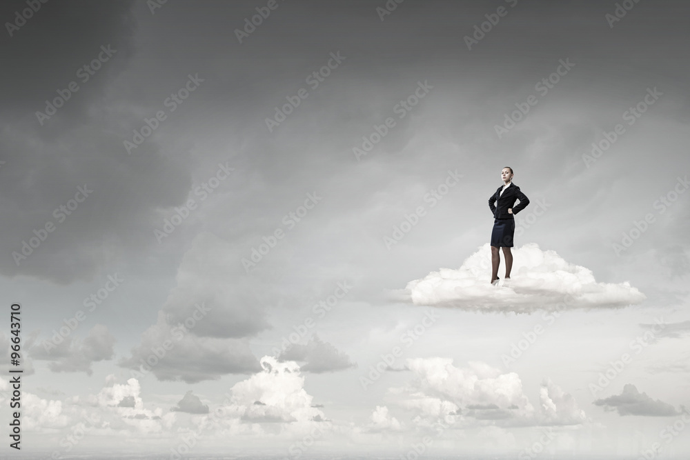 Successful businesswoman on cloud